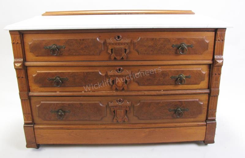 Appraisal: A Victorian three drawer dresser walnut with burl veneer marble