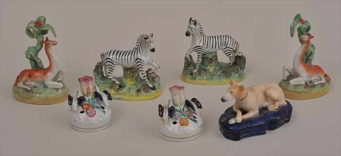 Appraisal: FIVE STAFFORDSHIRE ANIMAL FIGURES AND A PAIR OF INKWELLS Comprising