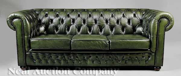 Appraisal: A Chesterfield Sofa of typical form upholstered in green leather