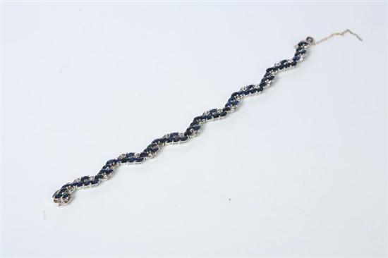 Appraisal: LADY'S DIAMOND AND SAPPHIRE BRACELET KT white gold bracelet in