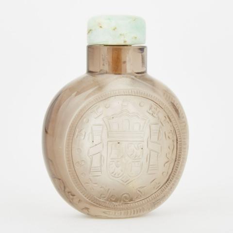 Appraisal: A Carved Smoke Rock Crystal Coin Snuff Bottle th th