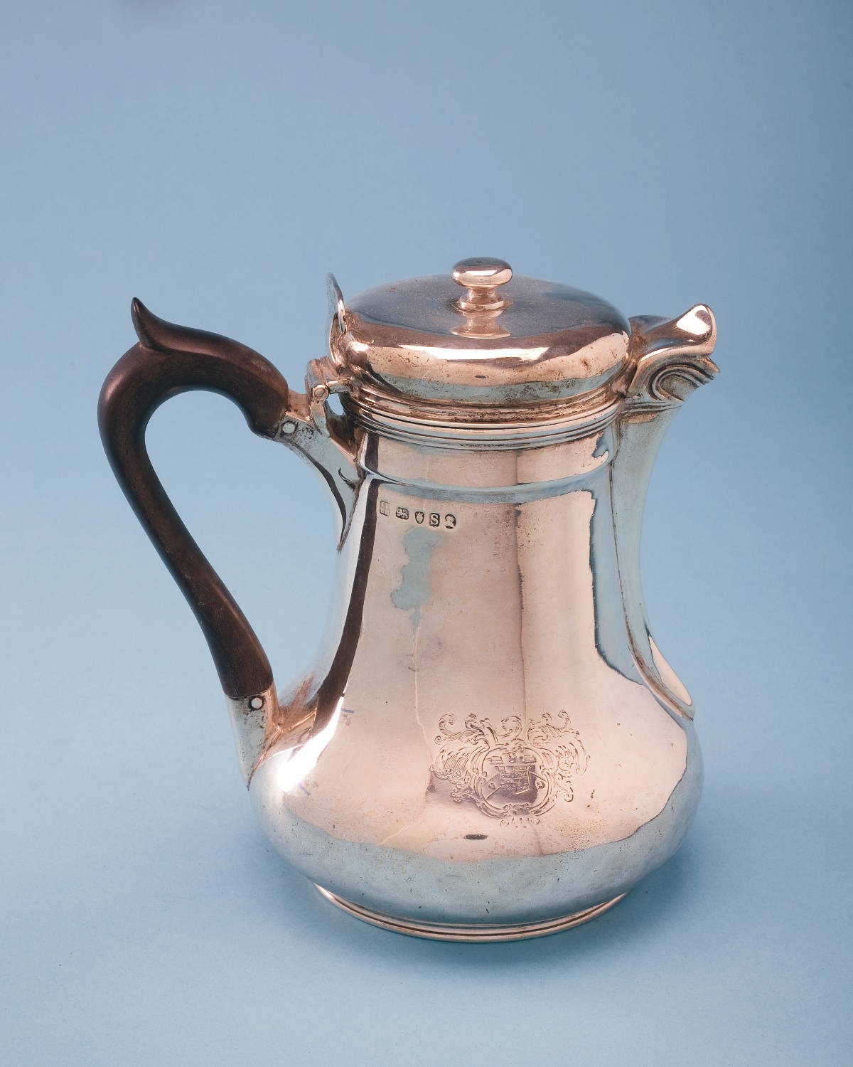 Appraisal: GEORGE III SILVER ARMORIAL HOT WATER JUG JOHN EDWARD EDWARDS