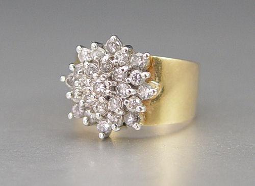 Appraisal: K WIDE BAND DIAMOND CLUSTER RING K yellow gold ring