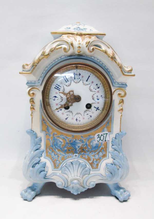 Appraisal: CHINA CASE MANTEL CLOCK with time and bell strike movement