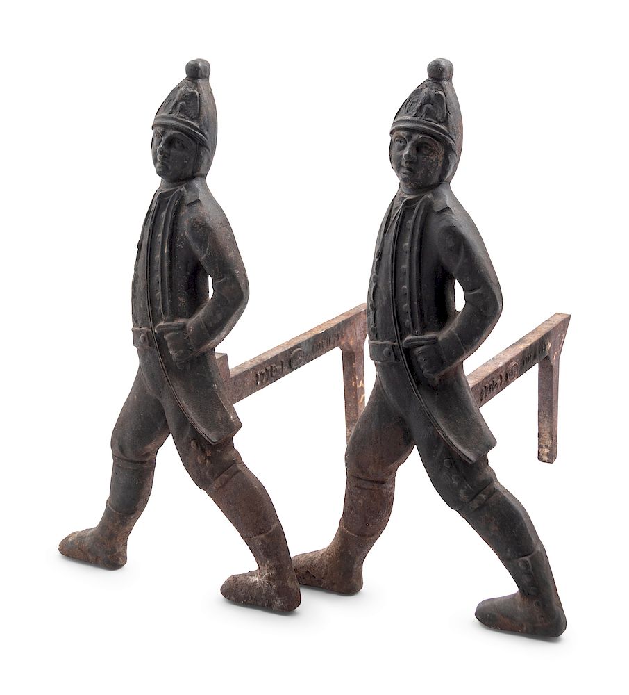 Appraisal: A Pair of Cast Iron Hessian Soldier Andirons A Pair