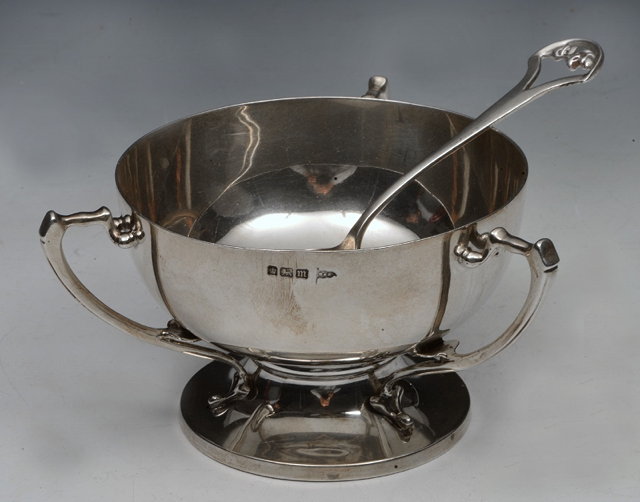 Appraisal: AN EDWARDIAN SILVER ARTS AND CRAFTS STYLE BASIN with three