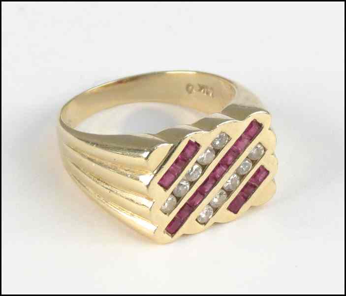 Appraisal: RUBY DIAMOND AND KARAT YELLOW GOLD RING Comprised of channel