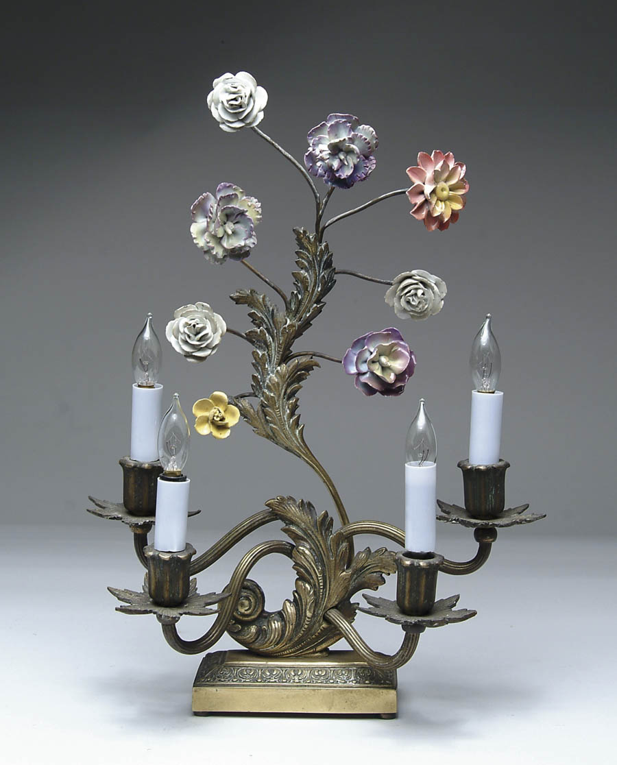 Appraisal: ELECTRIFIED FRENCH STYLE CANDELABRA The four branch light has flower