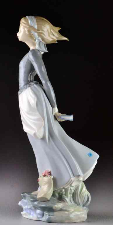 Appraisal: Lladro Porcelain Figurine ''Sea Breeze'' depicting slender woman with breeze