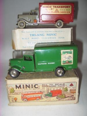 Appraisal: Two Minic clockwork long bonnet vans Express Service van beige