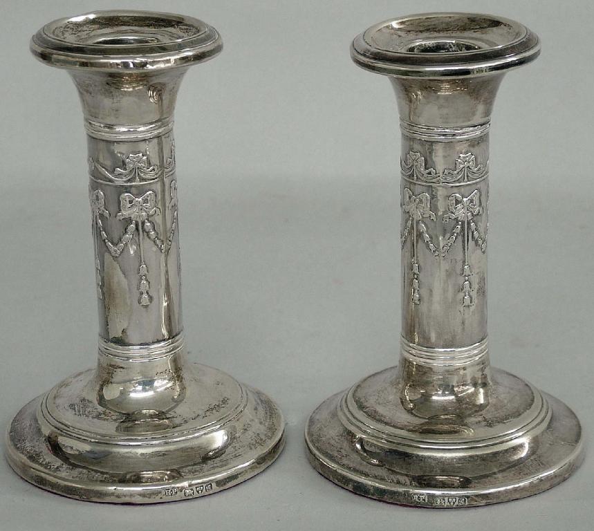 Appraisal: Pair of Edwardian dressing table candlesticks of circular form and