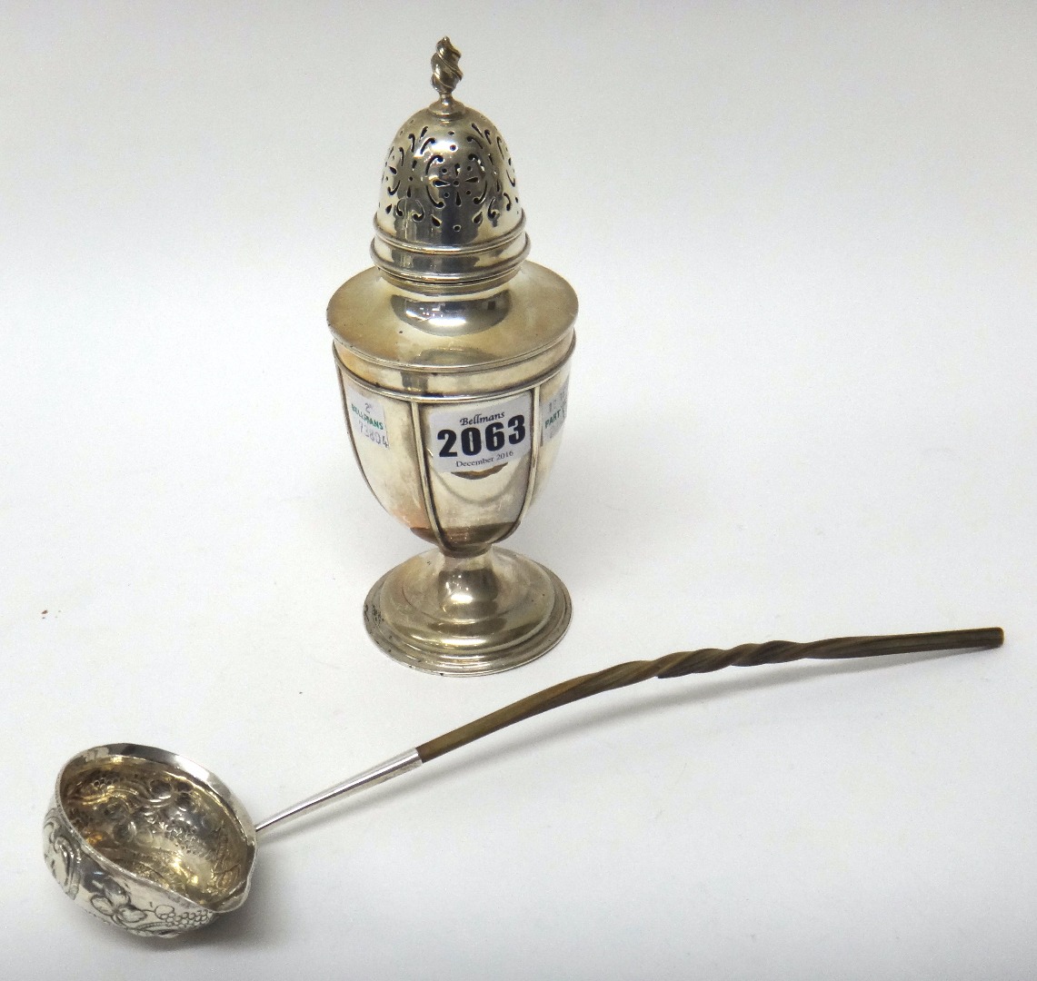 Appraisal: A silver sugar caster of urn form with a wrythen