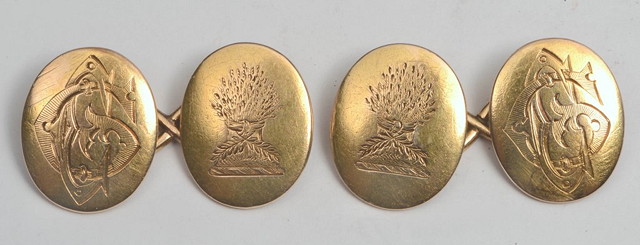 Appraisal: A PAIR OF GOLD COLOURED CUFFLINKS of plain form crested