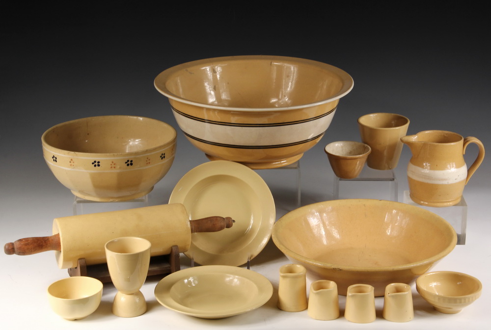 Appraisal: PCS YELLOW WARE POTTERY - Including Rolling Pin on stand