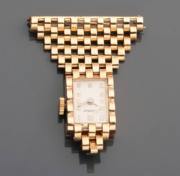 Appraisal: A fourteen karat gold brooch watch Cartier with box the