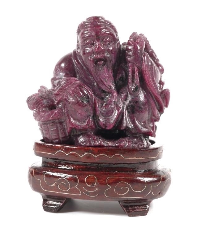 Appraisal: ANTIQUE CHINESE CARVED RUBY MATRIX MAN W FISHRuby matrix carved