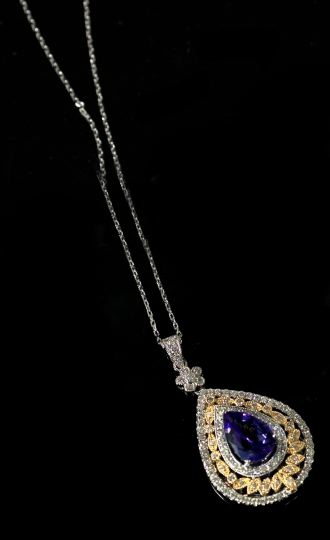 Appraisal: Lady's Fourteen-Karat Two-Color Gold Tanzanite and Diamond Pendant Necklace composed