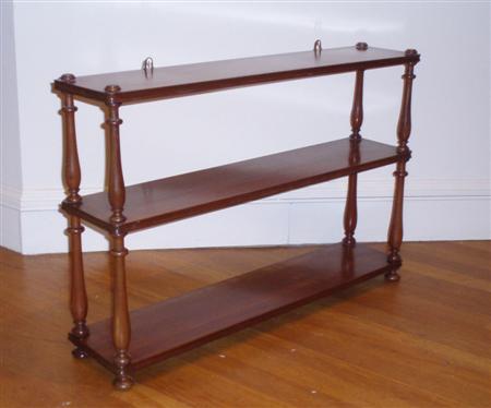 Appraisal: A set of Victorian mahogany open hanging shelves comprising three