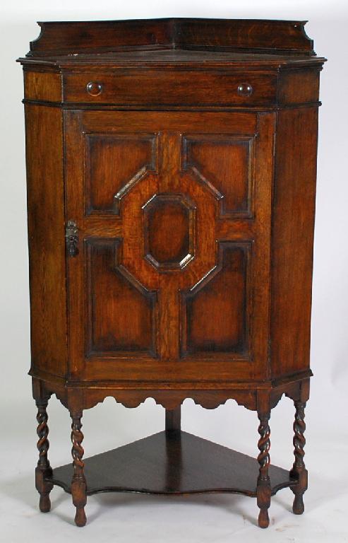 Appraisal: 's OAK FLOOR STANDING FLAT FRONTED CORNER CUPBOARD in the