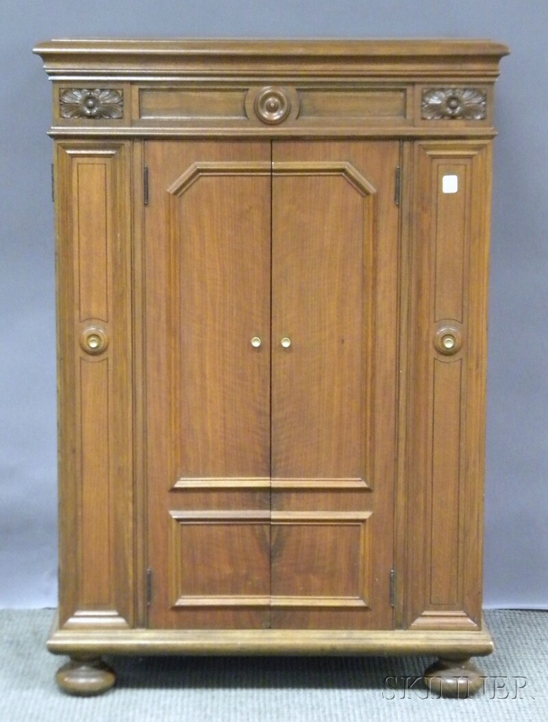 Appraisal: Late Victorian Carved Walnut Two-door Side Cabinet the interior with