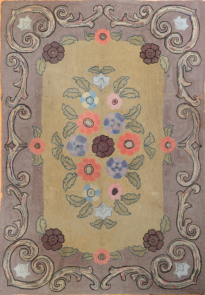 Appraisal: AMERICAN HOOKED RUG Worked with oval floral wreath within violet