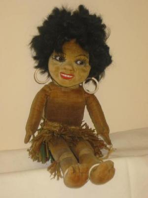 Appraisal: A Norah Wellings felt covered negro girl doll with moulded