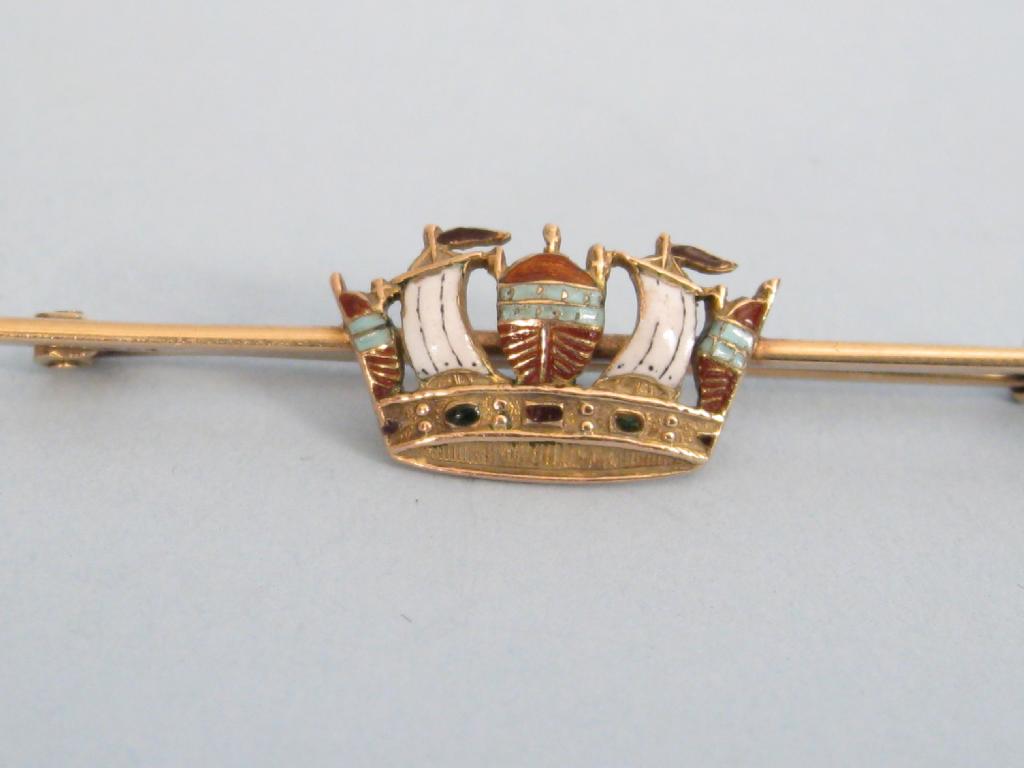 Appraisal: An enamelled Bar Brooch in the form of a coronet