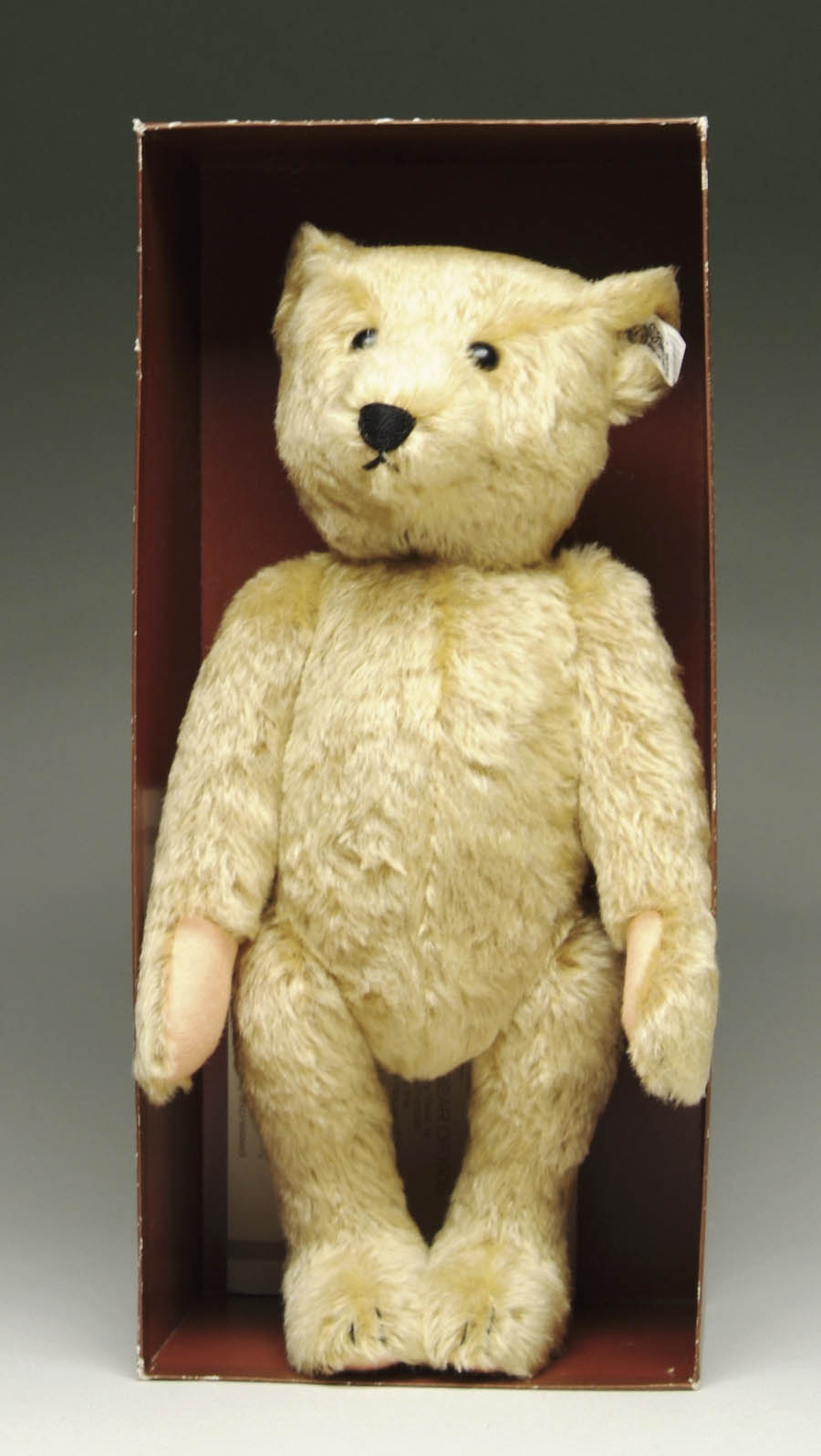 Appraisal: STEIFF COMMEMORATIVE BEAR Circa s with button and tag in