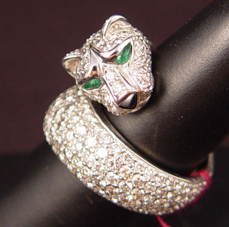 Appraisal: PLATINUM DIAMOND AND EMERALD CAT TIGER WRAP RING Platinum ring