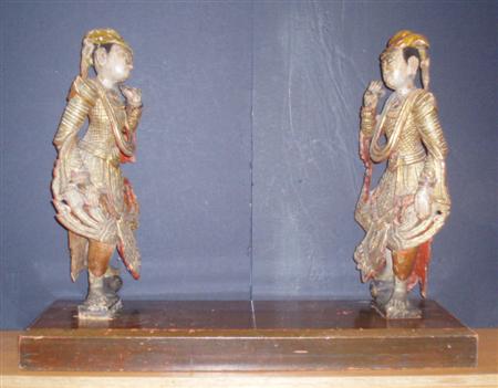 Appraisal: A pair of Burmese painted and carved wood figures Probably