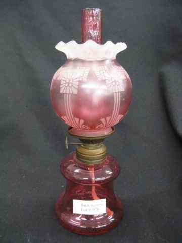 Appraisal: Victorian Miniature Art Glass Oil Lamp cranberry glass satin shade