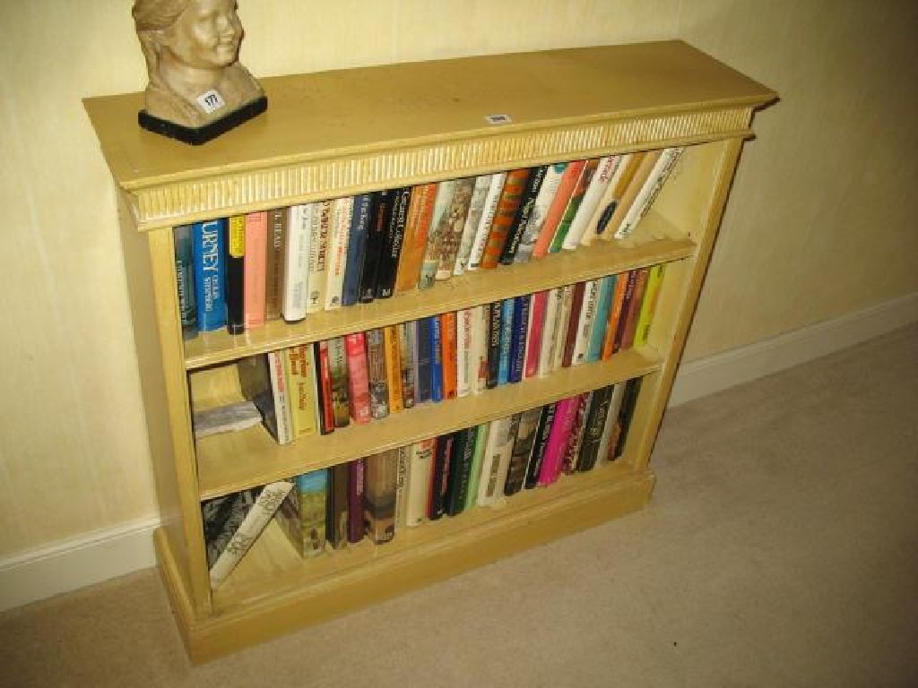 Appraisal: A GEORGE III STYLE OPEN BOOKCASE with a distressed painted