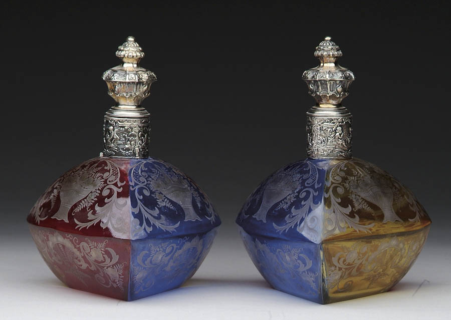 Appraisal: PAIR OF ENGRAVED DRESSER BOTTLES Outstanding pair of three-sided dresser