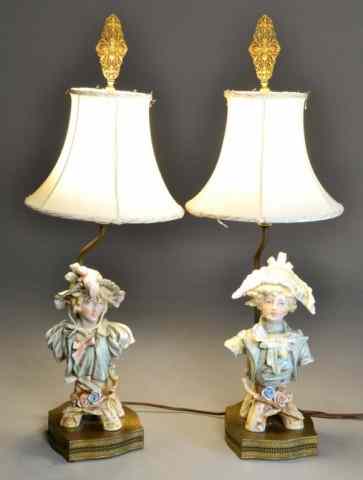 Appraisal: LAMPS WITH TH C PORCELAIN BUSTSElegant pair of lamps with