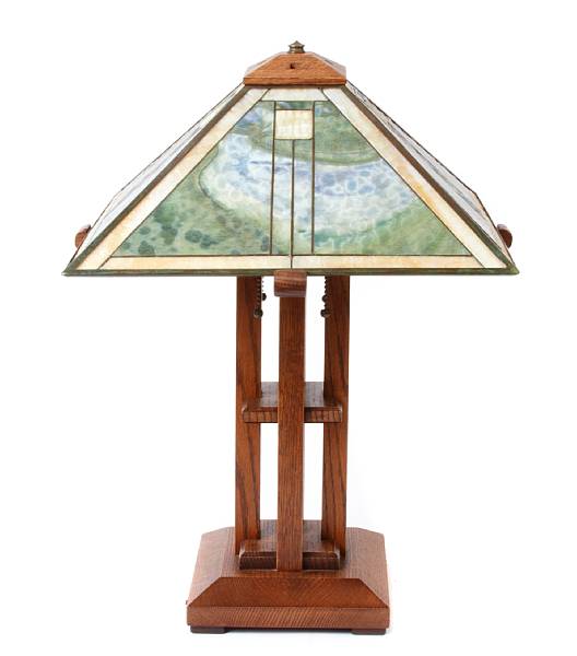 Appraisal: An Arts amp Crafts style oak and leaded glass table