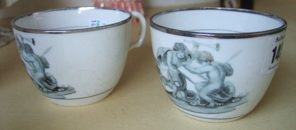 Appraisal: Two teacups early th century transfer printed with cherubic figures