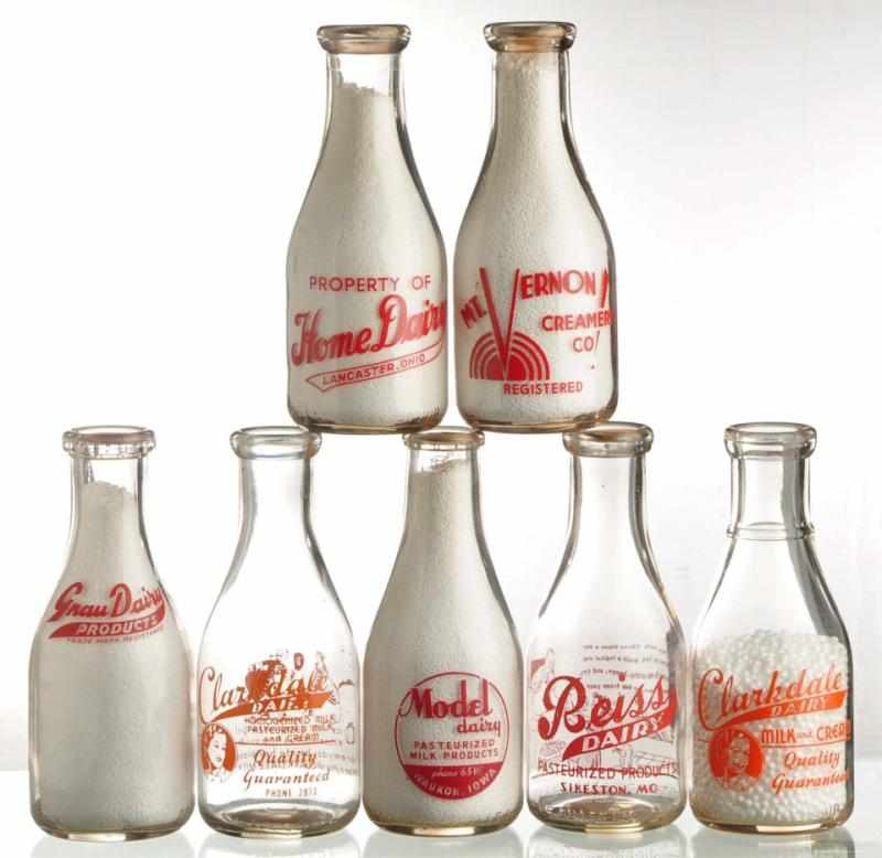 Appraisal: Lot of Milk Bottles from Various Locations Description Lot includes