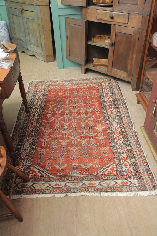 Appraisal: ORIENTAL RUG Area rug having multiple borders and red field