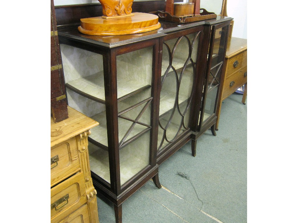 Appraisal: Glazed mahogany breakfront display cabinet