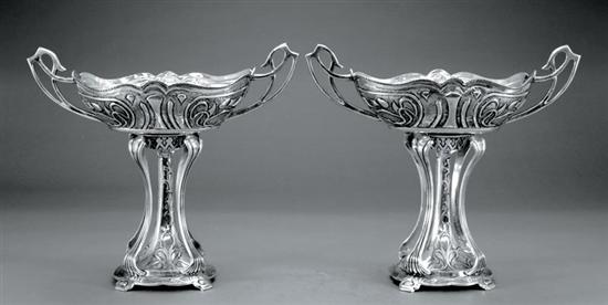 Appraisal: Pair Art Nouveau style silverplate compotes ovoid molded and chased