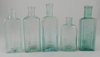 Appraisal: Medicine rectangular aqua bottles Medicine- rectangular aqua bottles- 'Genness Liniment'