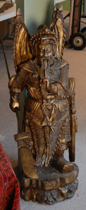 Appraisal: A Chinese Gilt Wood Figure of Daoist Diety Guan-yu standing