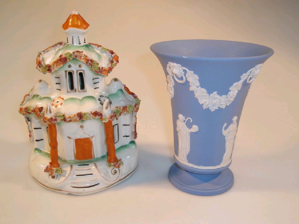 Appraisal: A Wedgwood blue jasper flared vase with classical decoration and