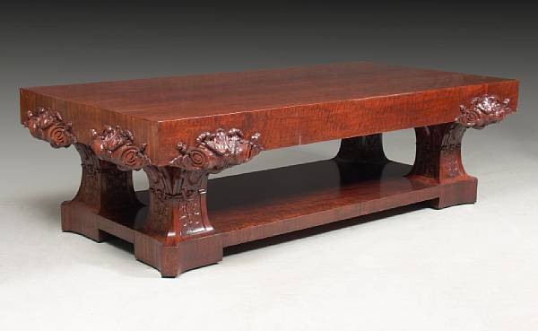 Appraisal: A Renaissance Revival carved mahogany library table early th century