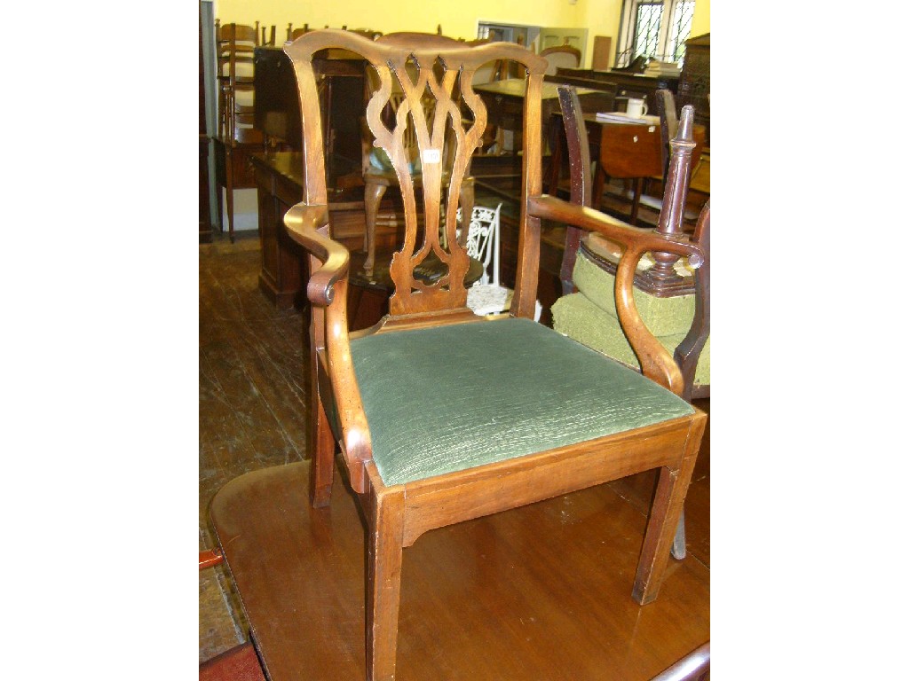 Appraisal: A Georgian mahogany elbow chair in the Chippendale style with