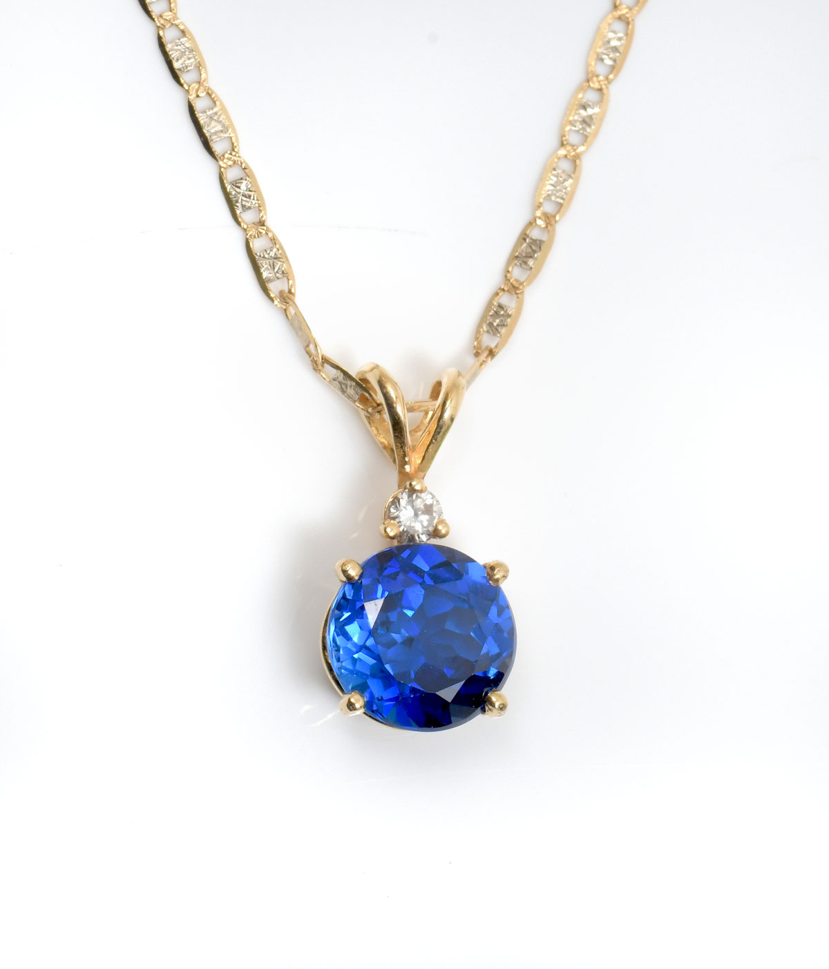 Appraisal: K PENDANT NECKLACE CHAIN Blue stone accented with diamond set