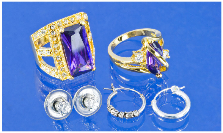 Appraisal: Two Yellow Metal Dress Rings Set With Purple Faceted And