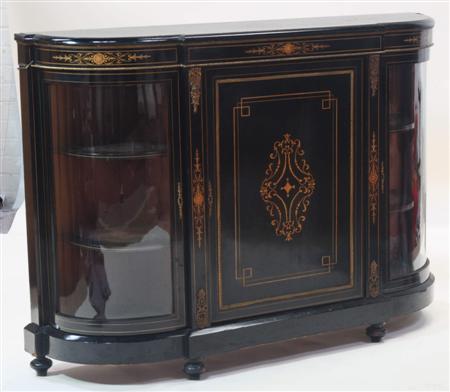 Appraisal: A Victorian ebonised credenza the moulded top above an inlaid