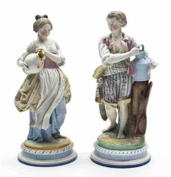 Appraisal: A Pair of Continental Porcelain Figures depicting a lady and