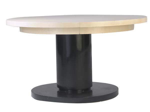 Appraisal: STYLE OF TOMMI PARZINGER Circular dining table with ivory-colored top